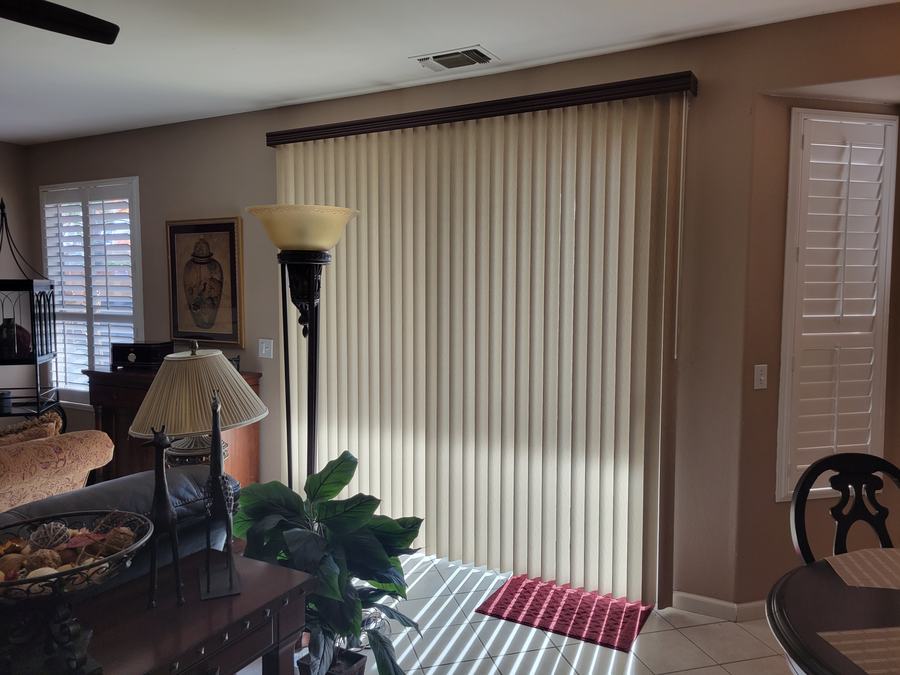 Vertical blinds across a dining slider