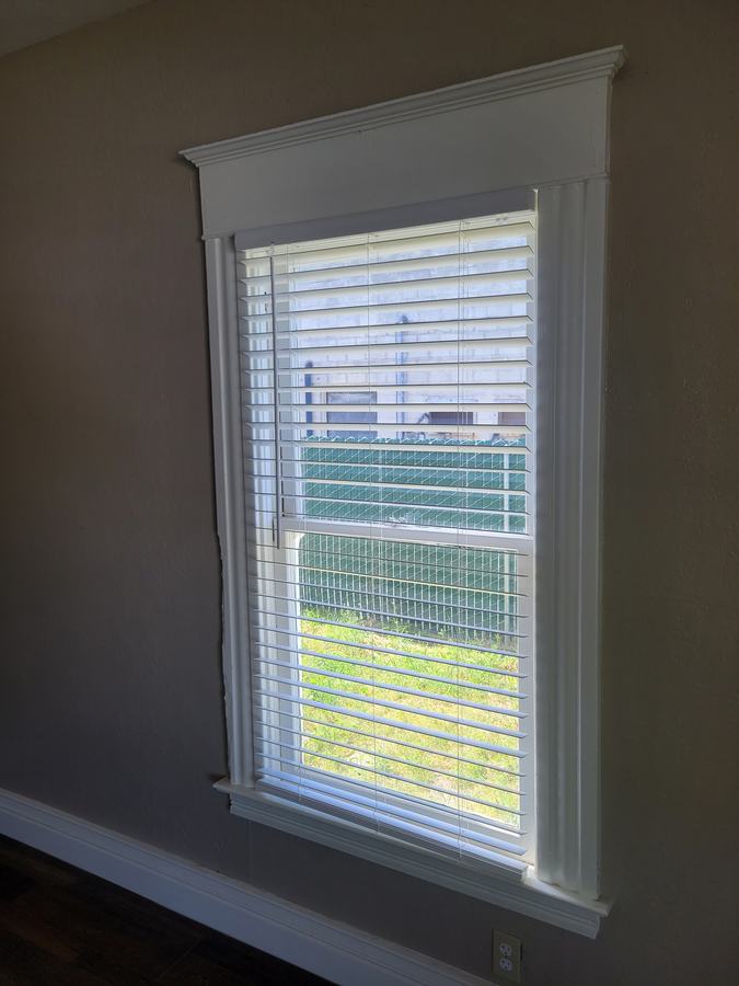 Faux wood on a bedroom window