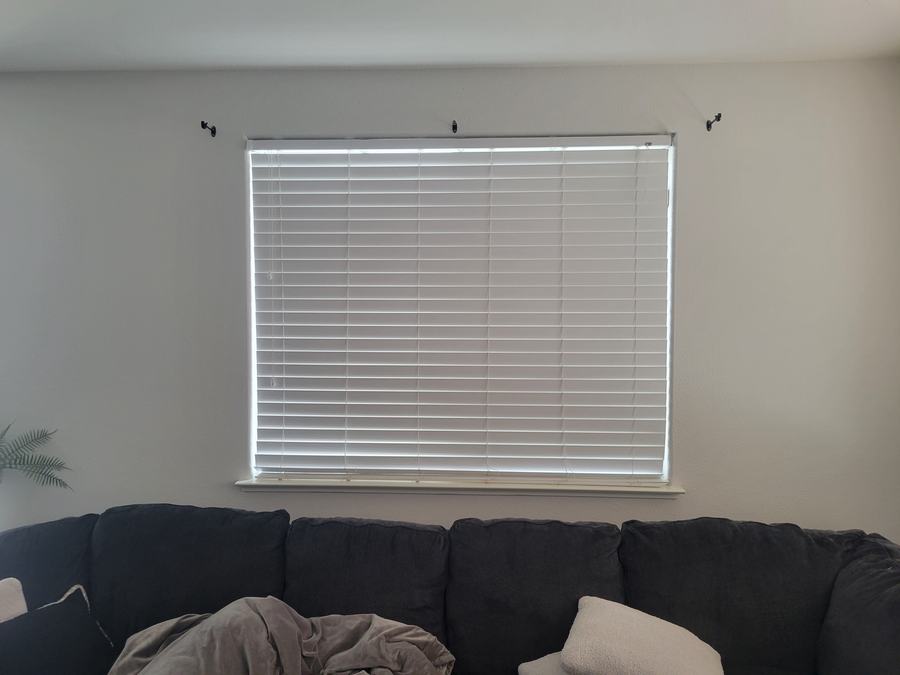Mini blind over a living room window