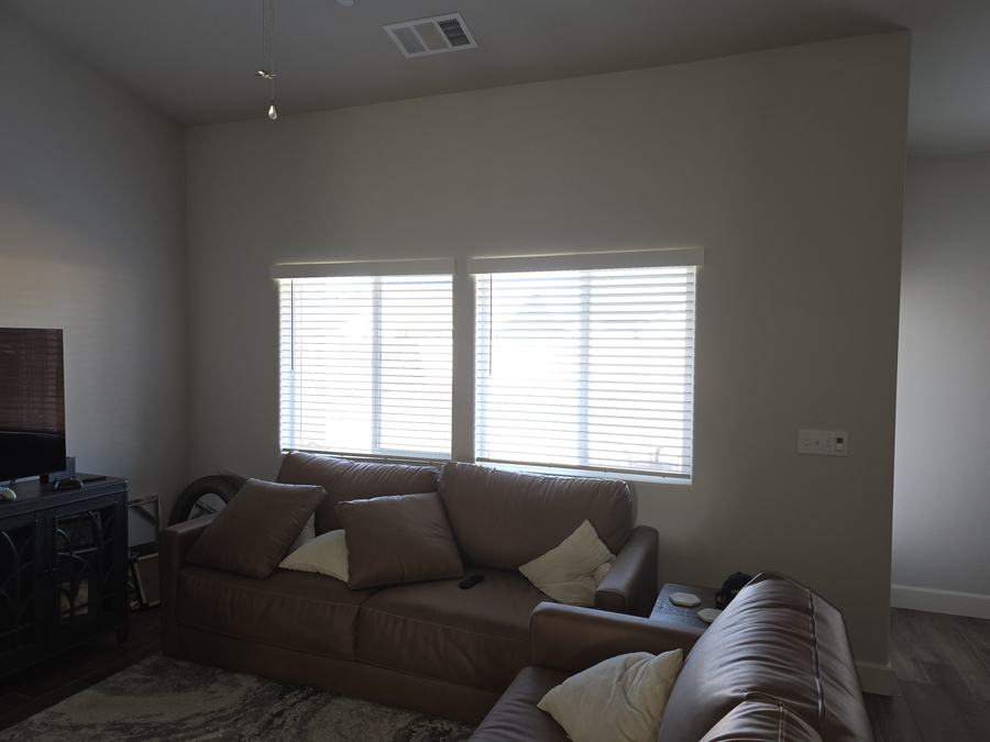 Living room, blinds level with the header