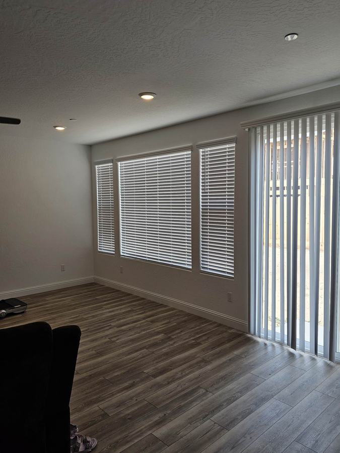 Verticals on the slider, blinds on the window
