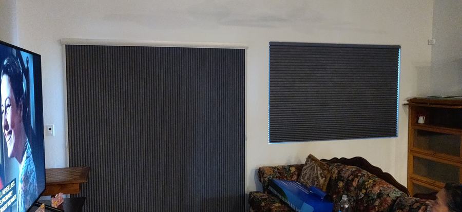 Two blackout shades either side of the screen