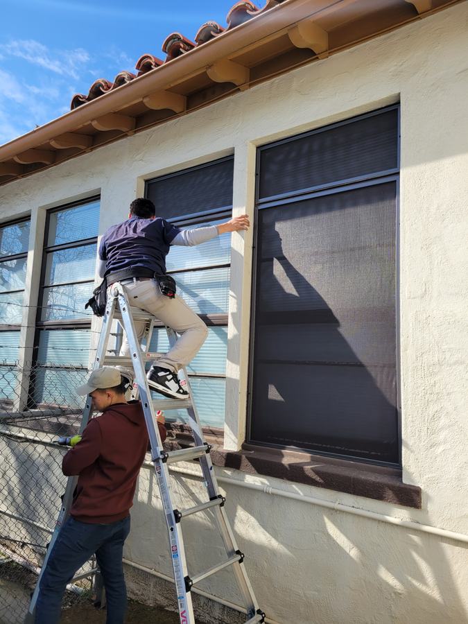 Solar screen going in, second story