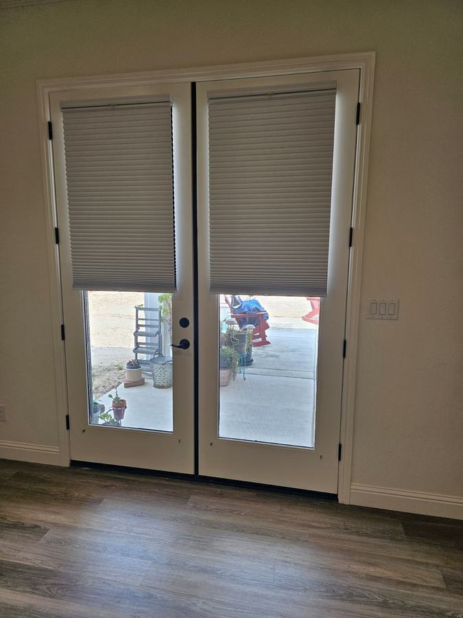 Door shades raised clear of the handles