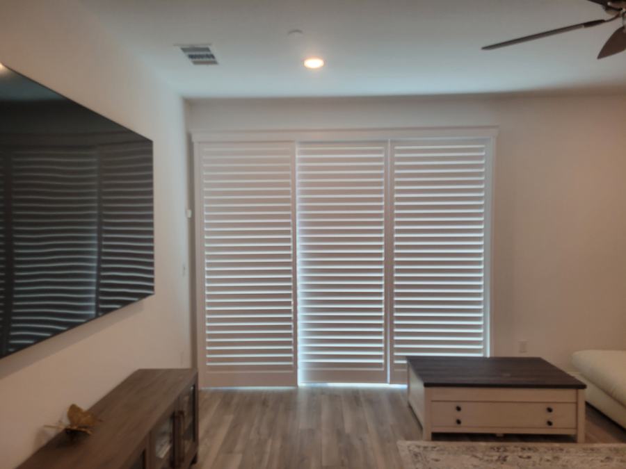 The same door, panels stacked open