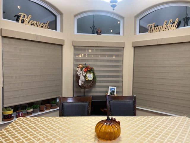 Roller shades under arched transoms