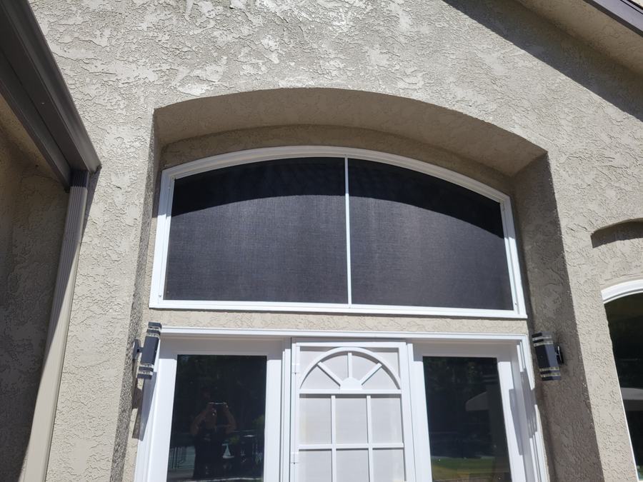 Arched solar screen cut to the radius