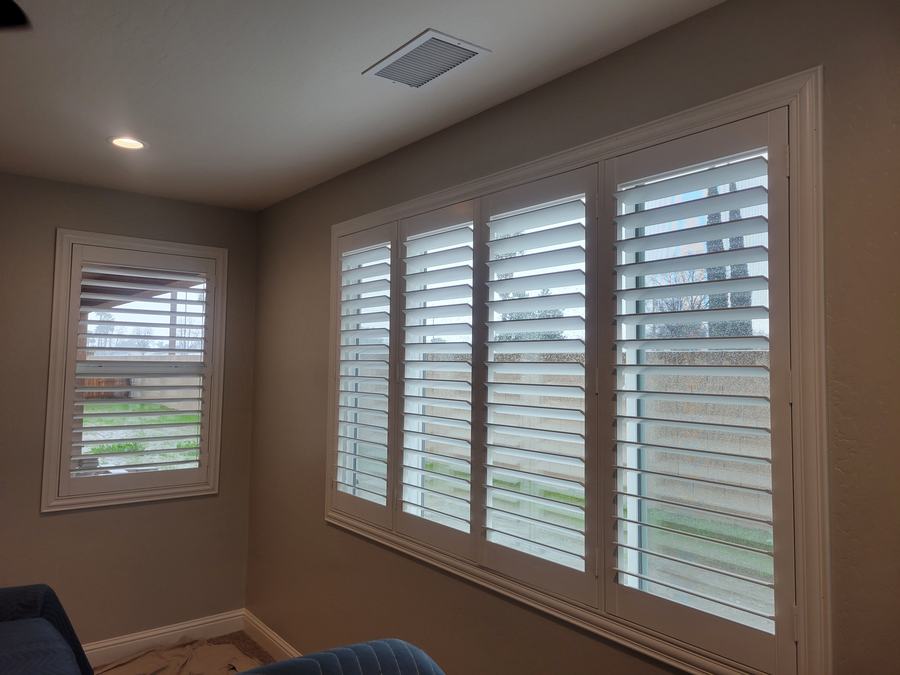 A run of shutters down a long wall
