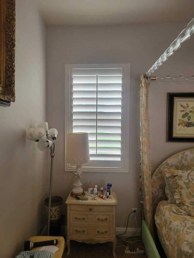 Bedroom shutter beside the fireplace