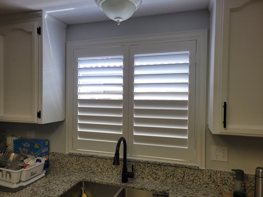 Kitchen shutters on a granite sill