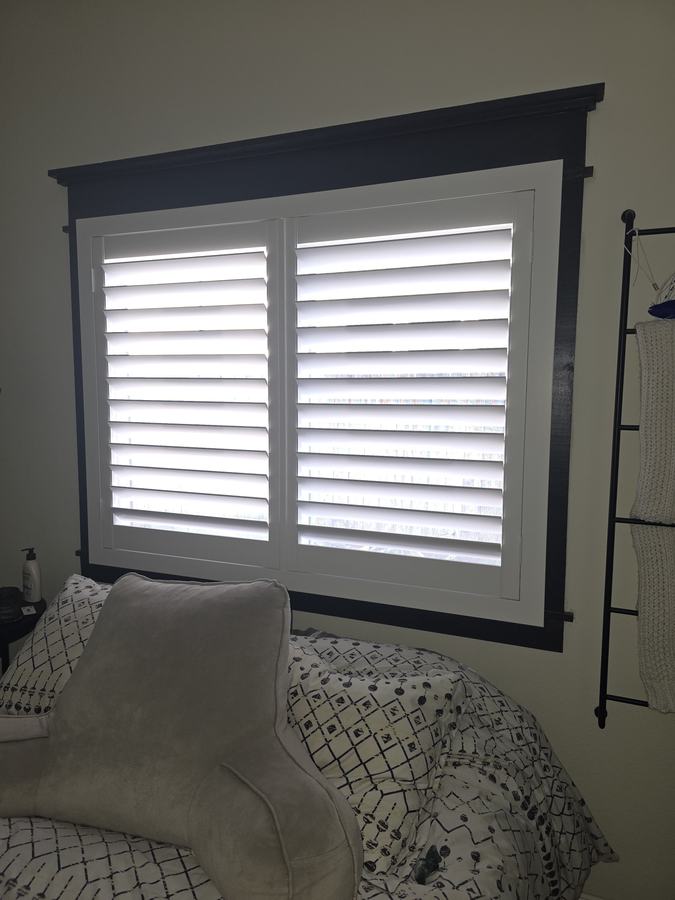 Shutters against dark trim