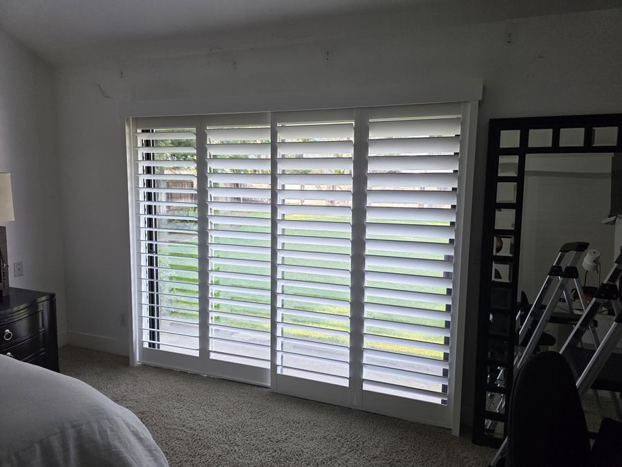 Bedroom, a full wall of shutters