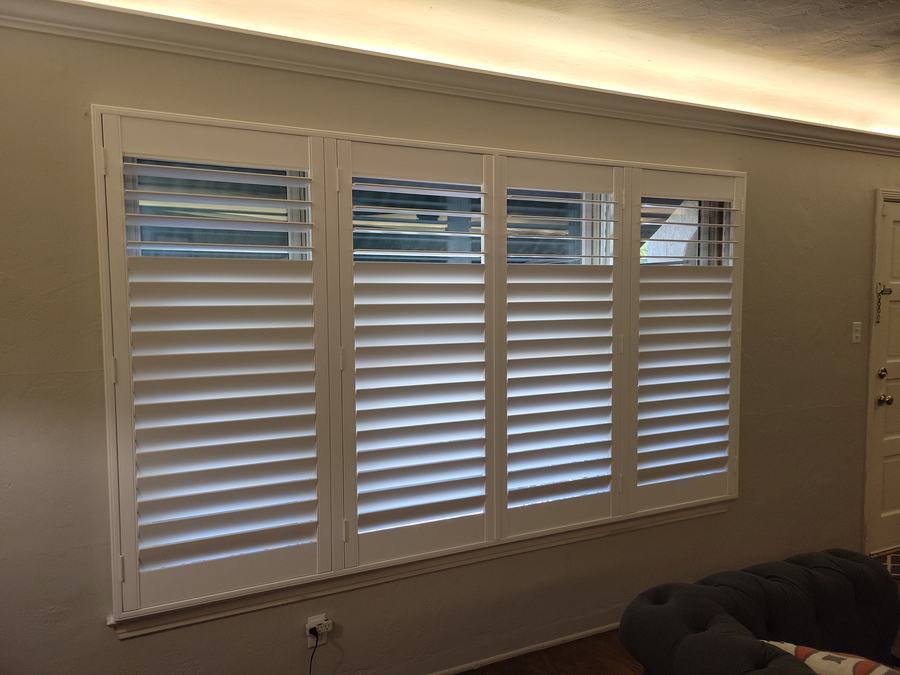 Four panels across a bedroom