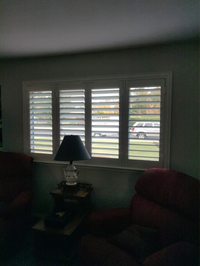 Sitting room, shutters and lamp