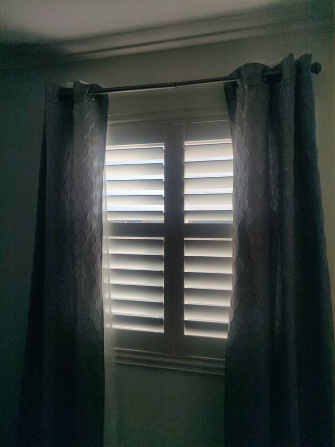 The same window, curtains drawn back
