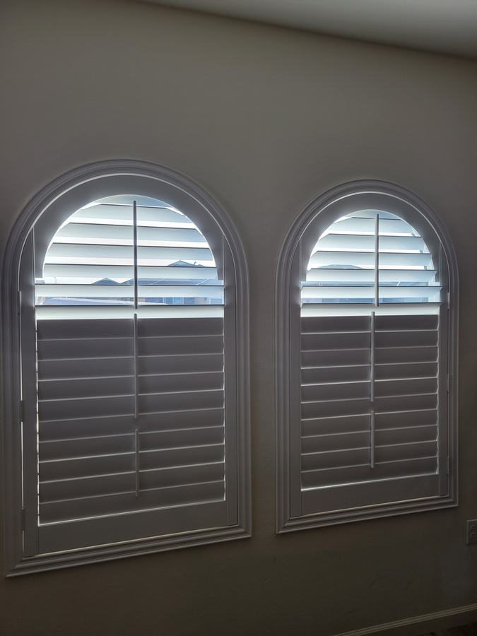 Two arches, louvers tilted to the view