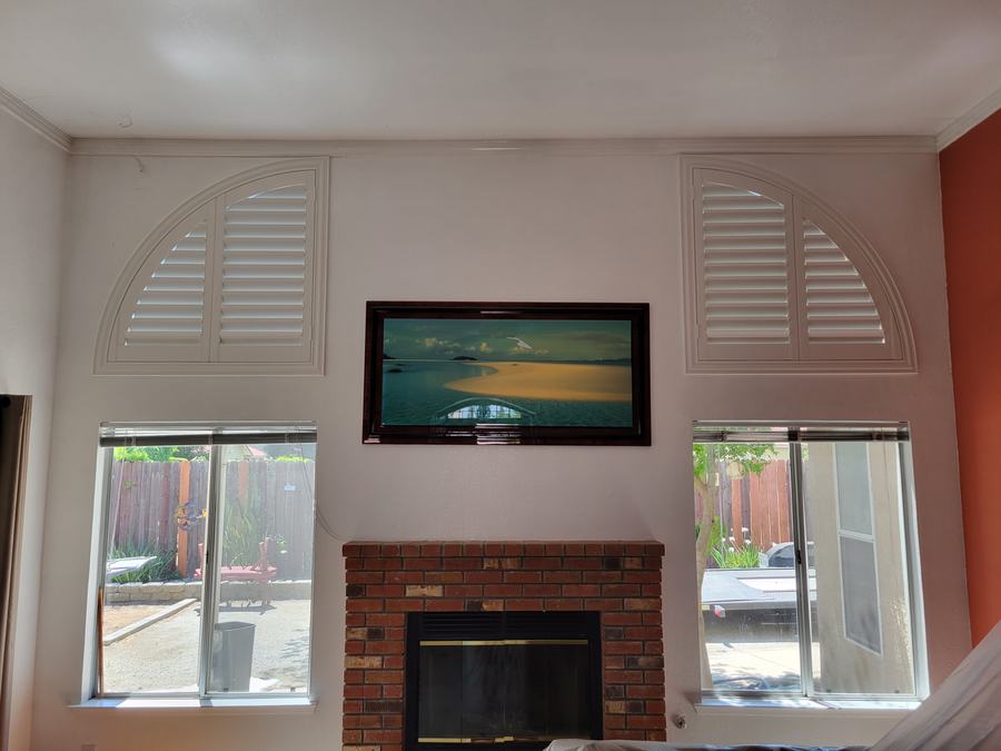 After: arch panels either side of the chimney